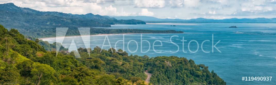 Picture of Panoramic view of a road going through the coast by the pacific ocean at Dominicalito beach in southern Costa Rica